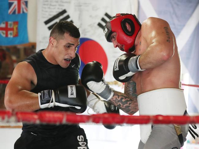 Olympic hope Justis Huni and top pro Demsey McKean sparring. Picture Annette Dew