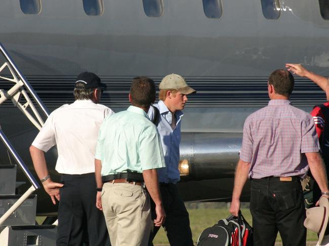 This 2003 photo shows a young Prince Harry arriving at Tamworth Airport by private jet from Perth before being flown by helicopter to his next destination. Picture: Marlon Dalton