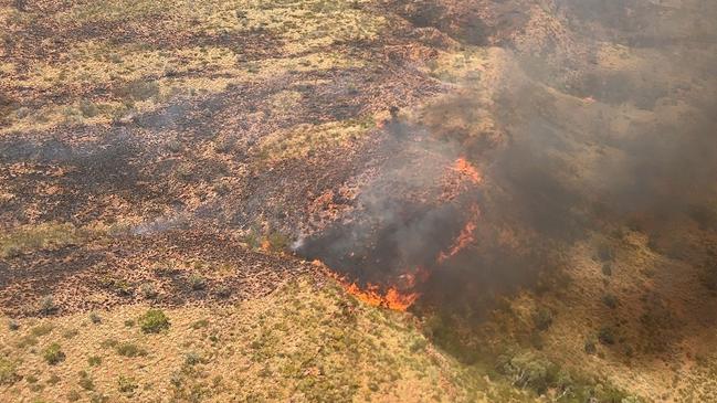 Volunteers and staff from Bushfires NT continue to battle out-of-control blazes in and around the lytwelepenty/Davenport Ranges National Park in Davenport. The national park will remain closed until at least November 4 as the fire is brought under control. Pic: Bushfires NT.