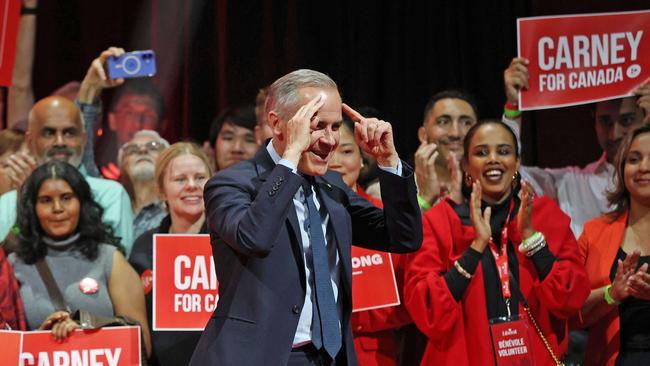 Canada's Prime Minister and Liberal Party leader Mark Carney gestures at supporters at a victory party in Ottawa, Ontario. Picture: Dave Chan / AFP