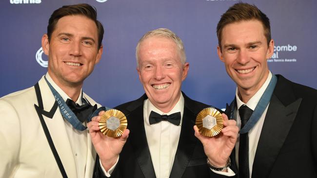 Matt Ebden, Craig Tiley and John Peers on the blue carpet. Picture: Tony Gough