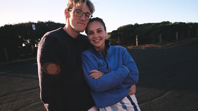 Mack Horton and girlfriend Ella Walter after surfing on a freezing day at Bells Beach