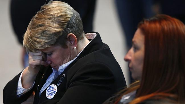 Hillary Clinton supporters react as results come in at an election night party for the Democratic presidential candidate. Picture: Vernon Bryant/The Dallas Morning News via AP