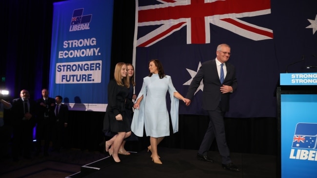 Scott Morrison arrives with his family at the Liberal Party HQ on Saturday night. Picture: NCA / Jason Edwards