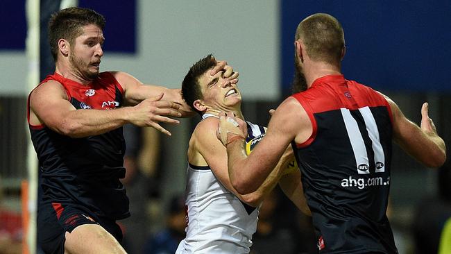 Sam Collins had a tough night on Jesse Hogan, who kicked four goals.