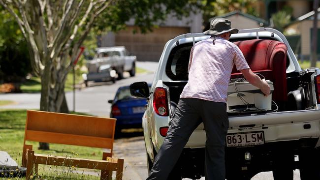 The familiar sight of kerbside scavenging will disappear from Brisbane’s streets for at least two years. Picture: File.