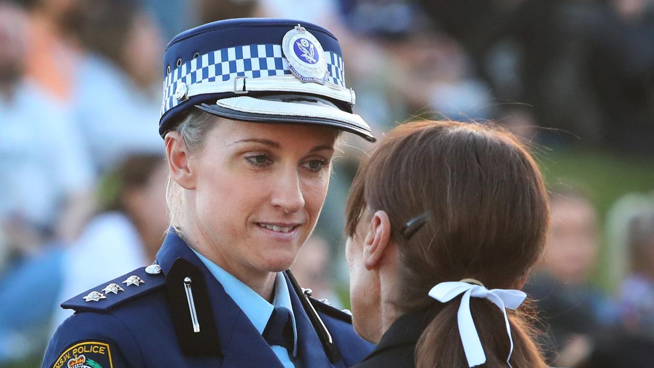 Police Inspector Amy Scott attends a community candlelight vigil for the victims of the Bondi Junction tragedy at Dolphin Court at Bondi Beach on April 21, in Sydney. Photo: Lisa Maree Williams