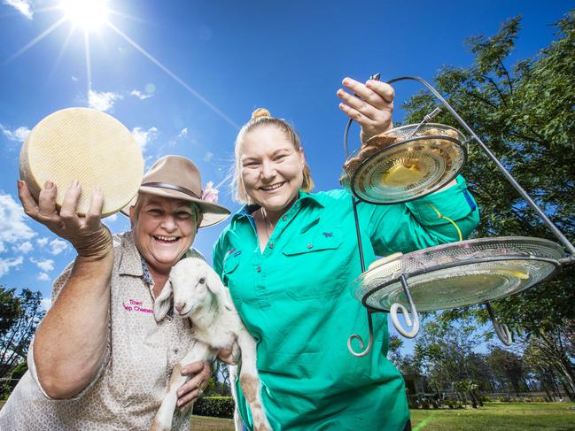 Towri Sheep Cheese’s Carolyn Davidson and daughter Dallas with Tony the lamb, a favourite among the tourists. Picture: Nigel Hallett