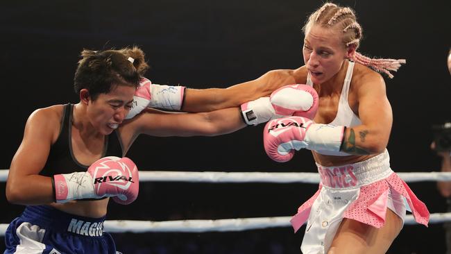 Dural’s Ebanie Bridges (right) battling it out against Mahiecka Pareno in her professional boxing debut on the undercard of the Star of the Ring boxing night at the Horden Pavilion, Sydney. Picture: Brett Costello