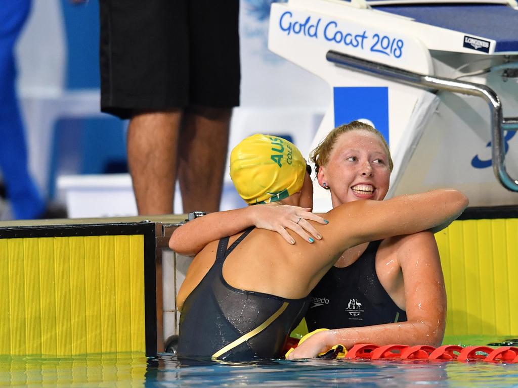 Lakeisha Patterson  hugs Ellie Cole after winning the Women's S9 100m Freestyle Final. Picture: AAP Image/Darren England