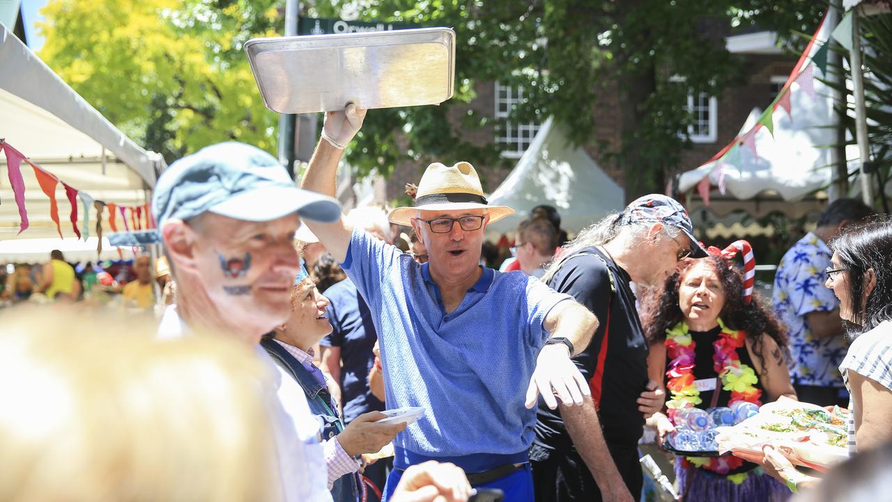 Former prime minister Malcolm Turnbull remains a popular local in his former electorate, pictured here at the Wayside Chapel Christmas lunch and street party in Kings Cross. Picture: Dylan Robinson