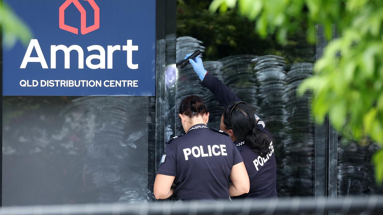 Police at the scene of a crime at Amart Store Support Centre, Rochedale. Picture: Liam Kidston