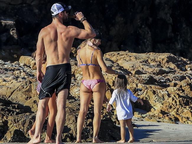 The fit family take a break from the surf. Picture: Media Mode