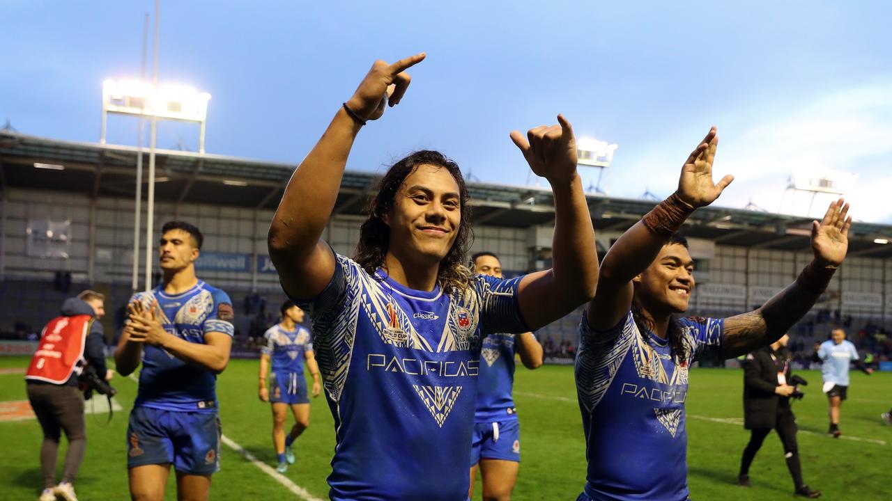 Jarome Luai of Samoa celebrates following the Rugby League World Cup Quarter Final match between Tonga and Samoa at The Halliwell Jones Stadium on November 06, 2022 in Warrington, England. (Photo by Alex Livesey/Getty Images for RLWC)