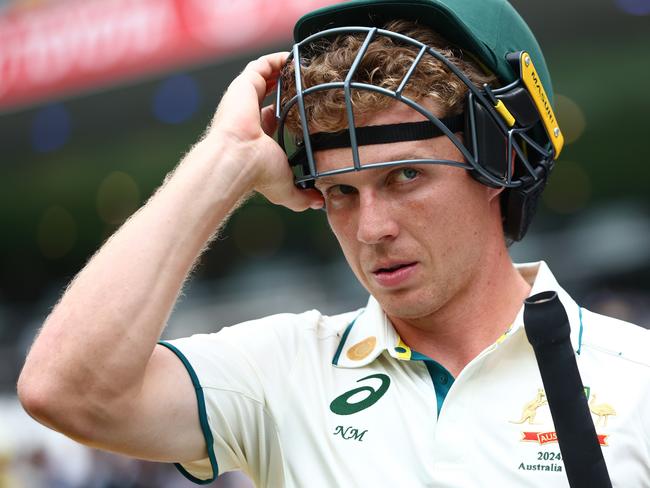 BRISBANE, AUSTRALIA - DECEMBER 18: Nathan McSweeney of Australia prepares to bat before play being delayed during day five of the Third Test match in the series between Australia and India at The Gabba on December 18, 2024 in Brisbane, Australia. (Photo by Chris Hyde/Getty Images)