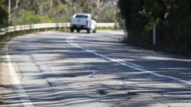 Potholes in Belair Rd create a hazard for cyclists. Picture: Tait Schmaal