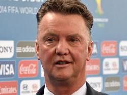 Netherlands' coach Louis Van Gaal, arrives for the final draw of the Brazil 2014 FIFA World Cup, in Costa do Sauipe, Bahia state, Brazil, on December 6, 2013. Thirty-two teams will learn their World Cup fate when the draw for Brazil's problem-plagued 2014 showpiece takes place today. AFP PHOTO / VANDERLEI ALMEIDA