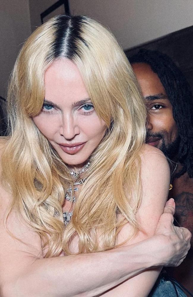 Madonna shared a series of bedroom selfies with her rumoured new man.