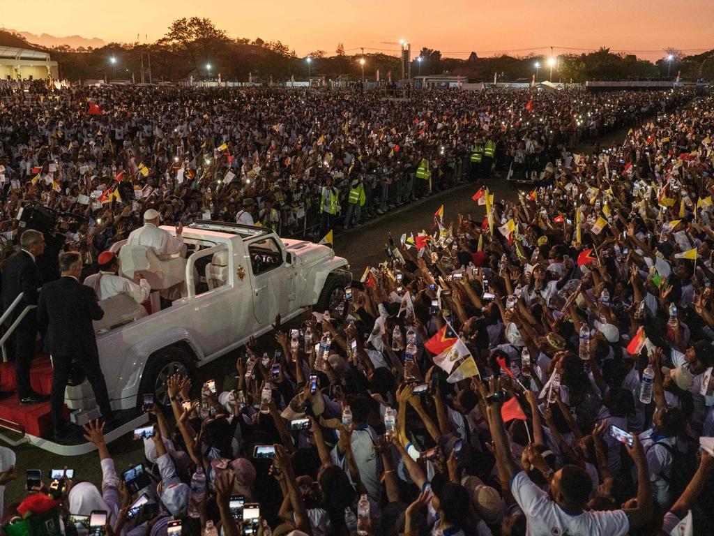 Pope Francis gestures to Catholic faithful after leading holy mass at the Esplanade of Tasitolu in Dili, East Timor, on September 10, 2024. Picture: AFP