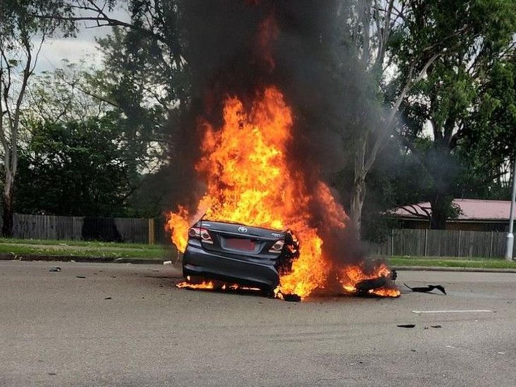The car immediately burst into flames, with spilt fuel sending the blaze into the gutter. Picture: Nine News