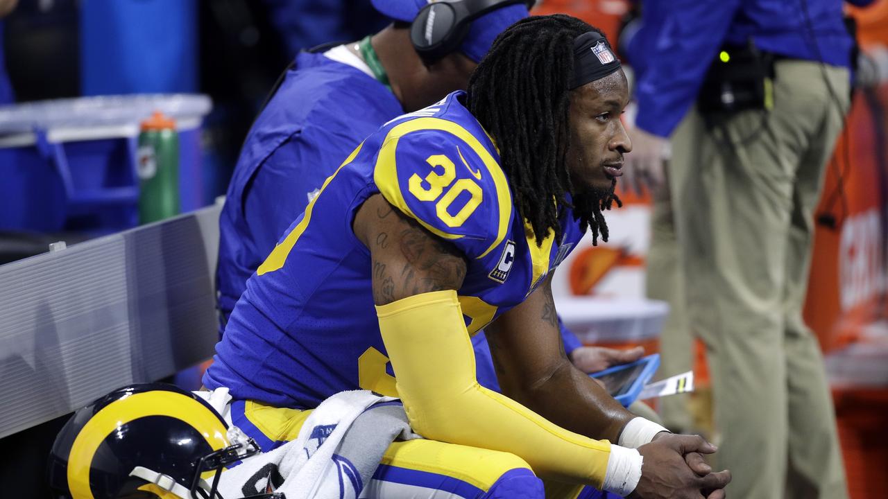 Los Angeles Rams' Todd Gurley II watches from the bench during Super Bowl LIII.