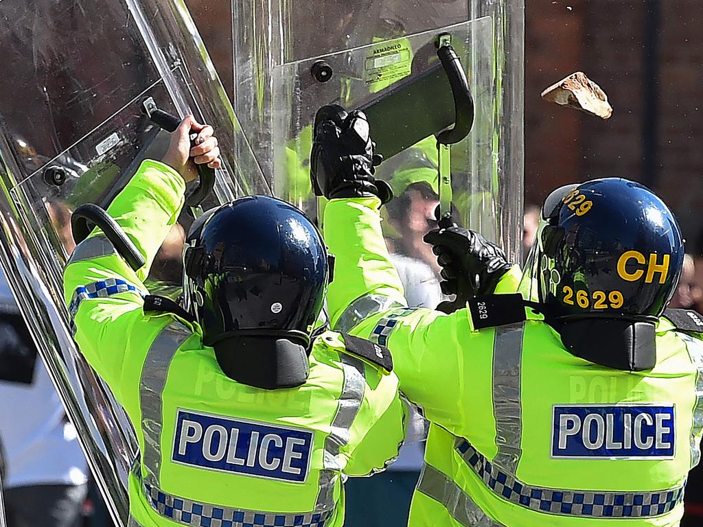 A massive police operation will continue indefinitely in a bid to quash violent riots. Picture: AFP