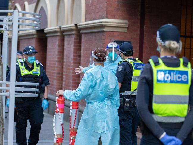 MELBOURNE, AUSTRALIA - APRIL 08: A general view of activity as Hotel Quarantine workers are seen outside the Intercontinental Hotel on April 08, 2021 in Melbourne, Australia. International passenger flights resume flying into Melbourne from Thursday, with Victoria introducing new hotel quarantine measures. International flights were banned in mid-February after Victoria went into a snap five-day lockdown following a COVID-19 outbreak linked to the Holiday Inn Melbourne Airport hotel, which saw the more virulent UK strain of the virus leak from the quarantine system and into the community. International arrivals will be capped at 800 in the first week, with the cap extending to 100 as more hotels become operational. (Photo by Asanka Ratnayake/Getty Images)