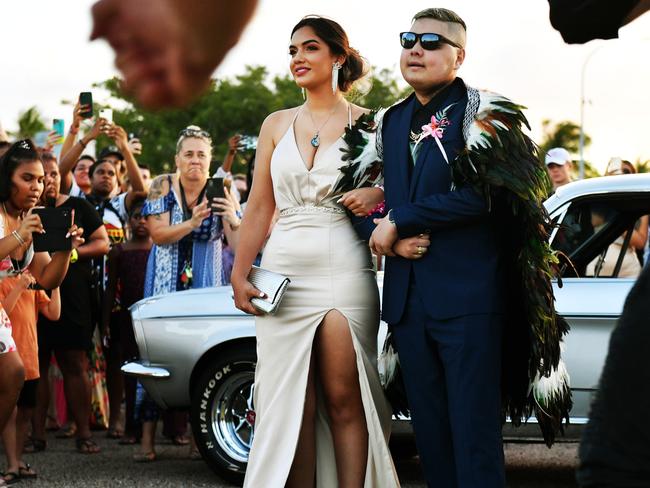 Raven Beddoes and Kaiya-Gene Kerekere arriving at the Kirwan State High School formal. Greeted by a Maori performance from family and friends. Kaiya was diagnosed with stage 4 cancer. Picture: Alix Sweeney