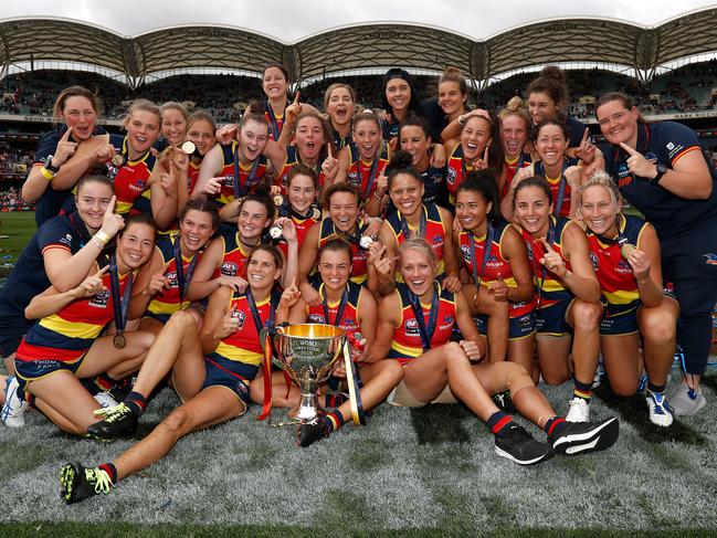 The Crows celebrate with the premiership cup winning the 2019 AFLW grand final over Carlton at Adelaide Oval on March 31. Picture: MICHAEL WILLSON/AFL PHOTOS