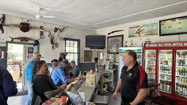 Miriam Vale Hotel Motel owner Mitch Brennan serving local customers on Sunday morning - two days (August 30 2024) - after a truck and ute fatal crash where ammonium nitrate in one of the tanks of the truck exploded and left a crater on the side of the Bruce Hwy.