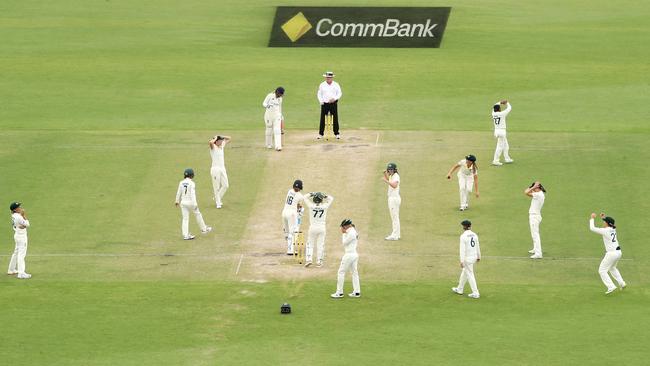 Kate Cross of England blocks out the final ball. Photo by Mark Kolbe/Getty Images