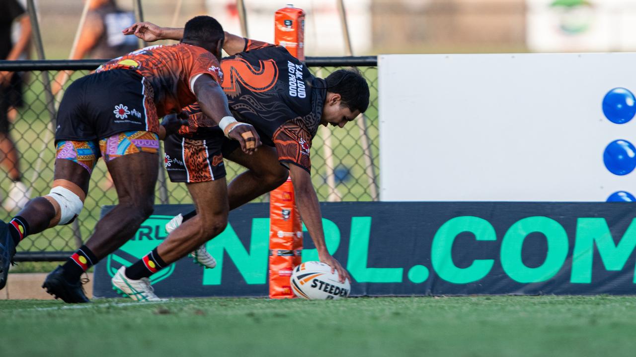 Dallas Caulton taps down a try at the 2024 Deadly Cup Carnival between the Indigenous All Stars and Territory All Stars. Picture: Pema Tamang Pakhrin