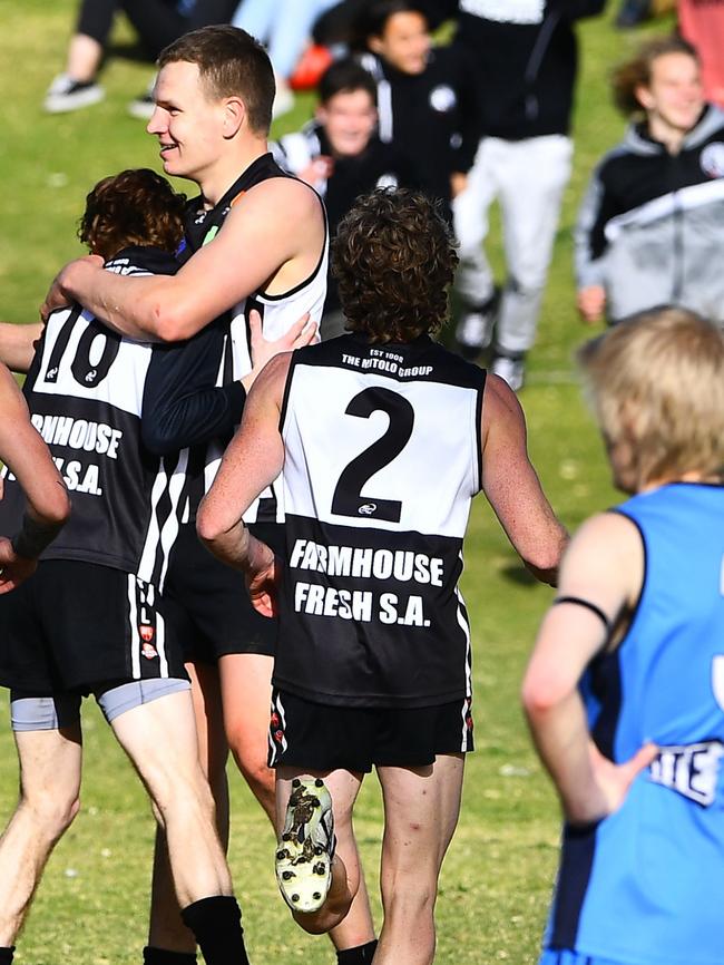 Teammates go in to congratulate Nobes. Picture: Grant Schwartzkopff