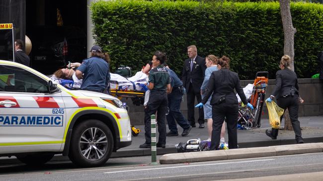 An electric scooter rider has possibly hit a pedestrian along Queens Bridge street Southbank in front of Crown Towers. The accident appears to have happened within a cycling lane with the pedestrian not crossing at a proper crossing. Picture: Jason Edwards