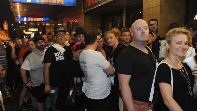 Fans wait outside the Forum Theatre in Melbourne for last night’s Madonna invite-only performance. Picture: Andrew Henshaw