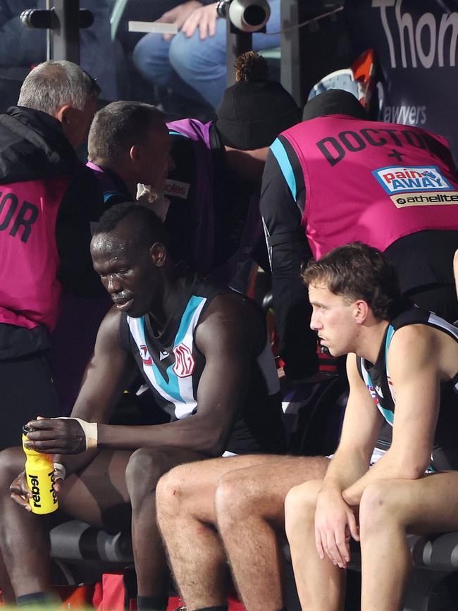 After a small stint on the bench, Aliir returned to the field. Picture: Sarah Reed/AFL Photos