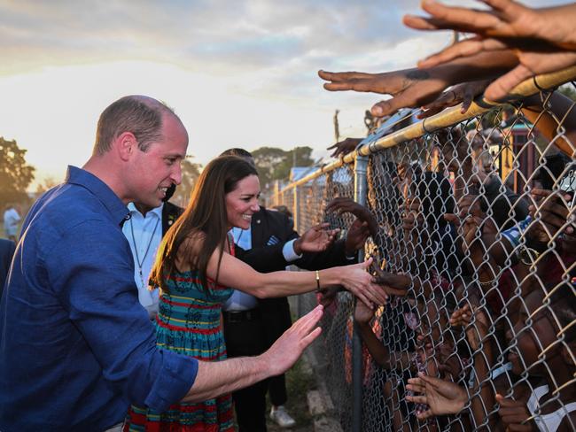 Prince William and Princess Catherine visit Kingston, Jamaica during their tour of the Caribbean in March 2022. The royal couple copped some criticism for appearing to ignore concerns about Britain’s colonial past and its role in the slave trade – and the images of them shaking hands with locals behind wire fences didn’t help matters. Picture: WireImage