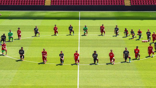 Liverpool players take a knee in support of protests over the death of George Floyd.