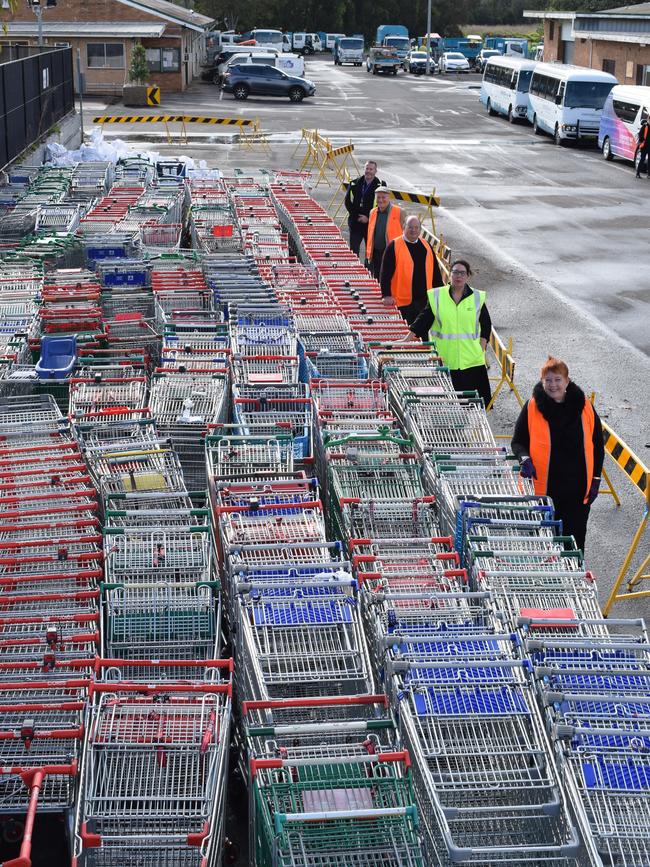 Liverpool Mayor Wendy Waller (front) with the 450 trolleys collected across Liverpool in one day. Picture: Liverpool City Council