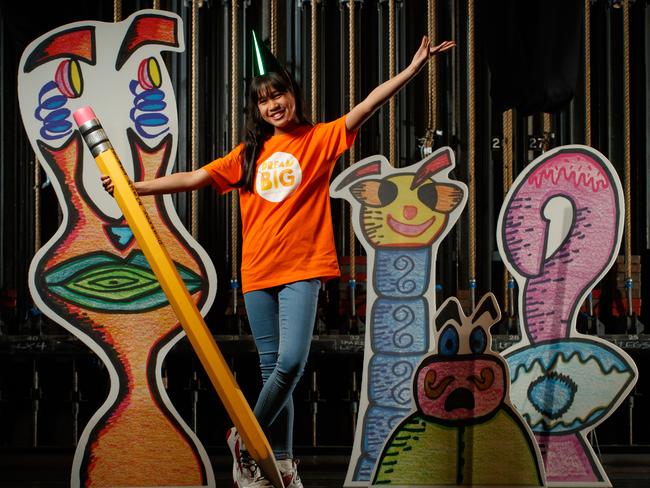 Phitchapha Ritnayom with some of her artwork at Dunstan Playhouse on September 16, 2020. PhitchaphaÃ¢â¬â¢s artwork was chosen for the cover of the program of The DreamBIG children's festival and the festival's theme. Picture Matt Turner.
