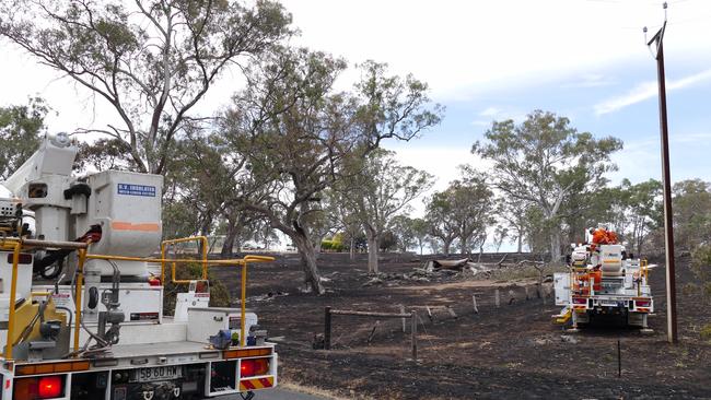 SA Power Networks at work on the Cudlee Creek fireground. Picture: SAPN