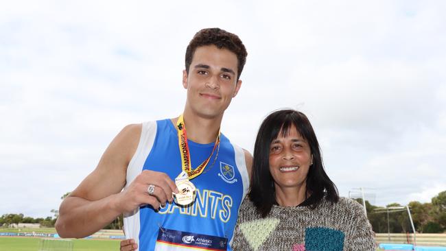 Saints Athletic Club sprinter Aidan Murphy and his mum Tania Van Heer after he won the men's open 200m and broke a 41-year-old state record at the State Track and Field Championships in February. Picture: Athletics SA