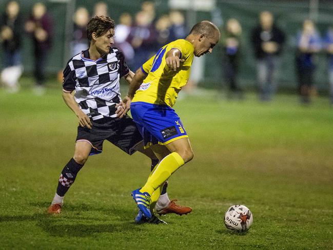 Gold Coast Premier League football (soccer) grand final between Gold Coast Knights and Broadbeach United from  at Croatian Sports Centre, Carrara, on Saturday. Broadbeach player, Russell Miner and Gold Coast Knights player,  Mathew Schmidt.  Picture: Jerad Williams