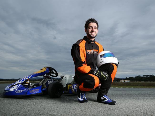 Courier-turned-race car driver Matthew Simmons. Picture: Luke Marsden