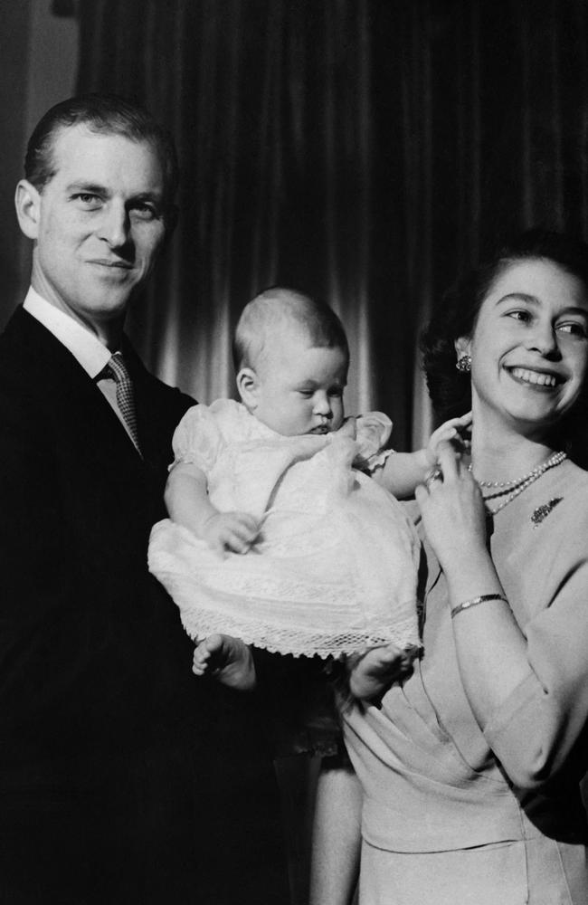 The royal couple with their eldest son Prince Charles. Picture: AFP