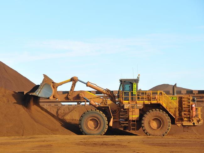 Stock image of Fortescue Metals Group's Christmas Creek iron ore operations in the Pilbara region of Western Australia, Tuesday, June 17, 2014. (AAP Image/Kim Christian) NO ARCHIVING