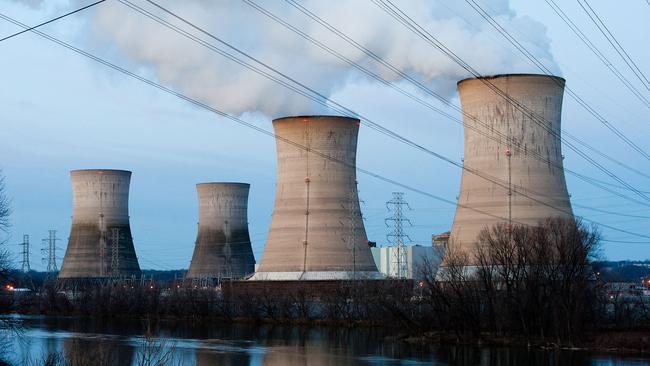 (FILES) The Three Mile Island Nuclear Plant on March 28, 2011, south of Middletown, Pennsylvania. The plant, site of the worst nuclear accident in US  history, is to restart operations in a deal to sell power to Microsoft, Constellation Energy said on September 20, 2024. The firm announced the 20-year deal would involve the restart of the Unit 1 reactor, "which operated at industry-leading levels of safety and reliability for decades before being shut down for economic reasons exactly five years ago today." The Unit 1 reactor was not involved in the March 28, 1979, partial nuclear meltdown. (Photo by JEFF FUSCO / GETTY IMAGES NORTH AMERICA / AFP)