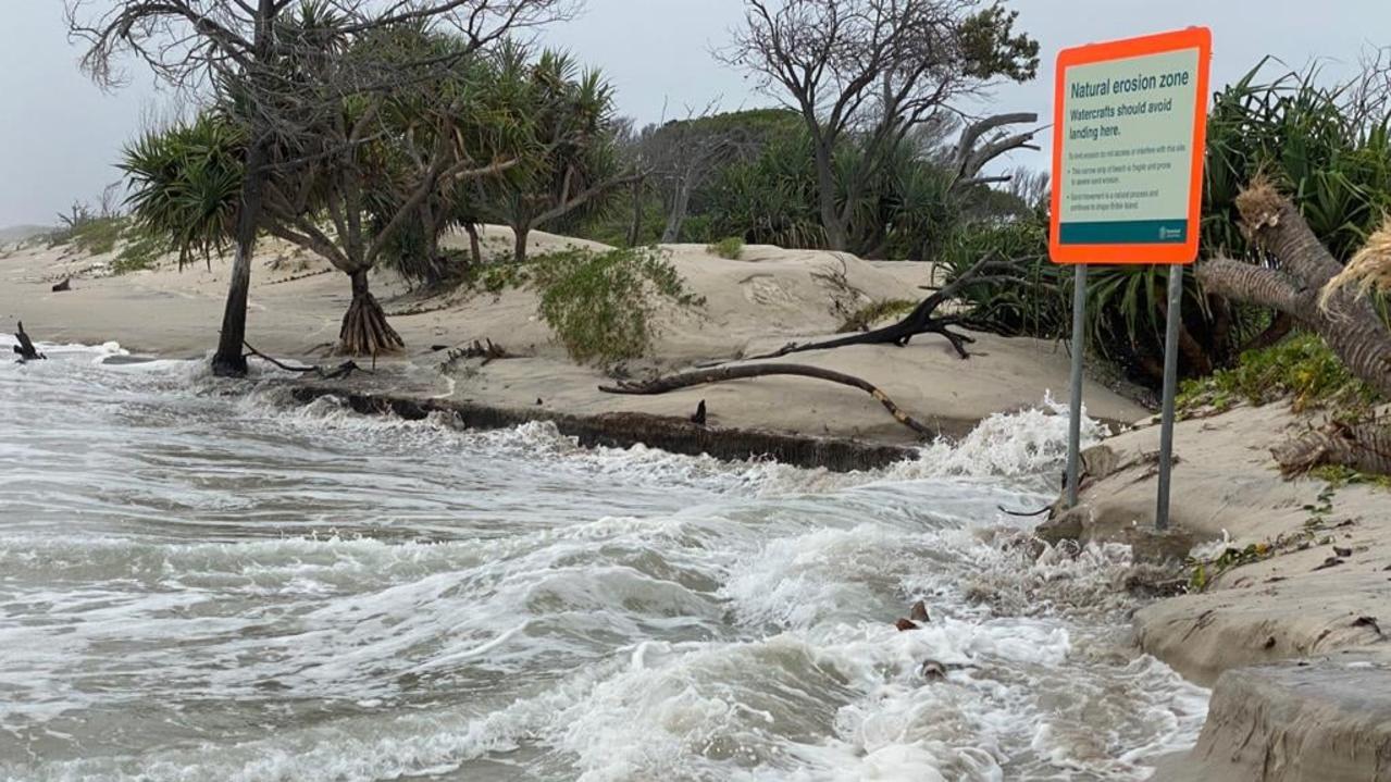 A king tide and huge swells combined to break through part of Bribie Island, creating a second bar into the Pumicestone Passage.