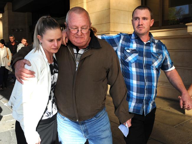 Keith Woodford leaves court, with daughter Alison and son Gary. Picture Greg Higgs 8/6/2017