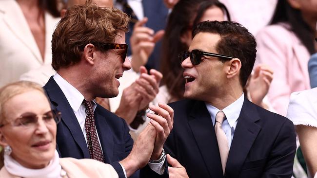 US actor Rami Malek (R) sits in the Royal Box to watch Alcaraz play against Medvedev. (Photo by HENRY NICHOLLS / AFP)